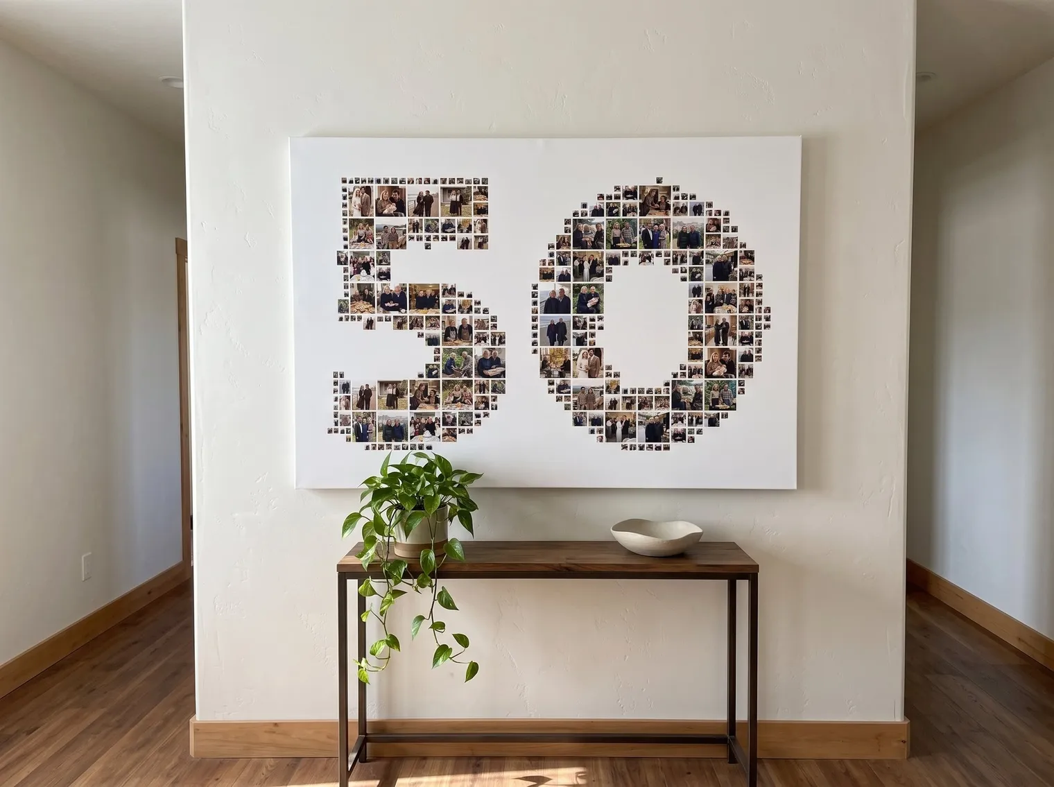 Number 50 photo collage printed on canvas hanging in a hallway